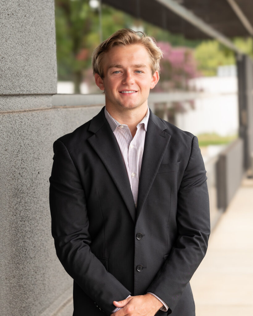 Professional headshot of REALTOR® Alexander Ward with The Jake Dickens Team at Berkshire Hathaway HomeServices C. Dan Joyner, REALTORS® Midtown office.