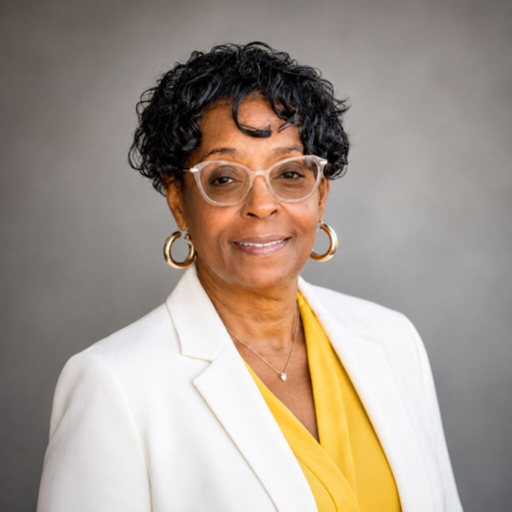 Professional headshot of REALTOR® Othelia Mosley smiling, representing Berkshire Hathaway HomeServices C. Dan Joyner, REALTORS® Midtown office.